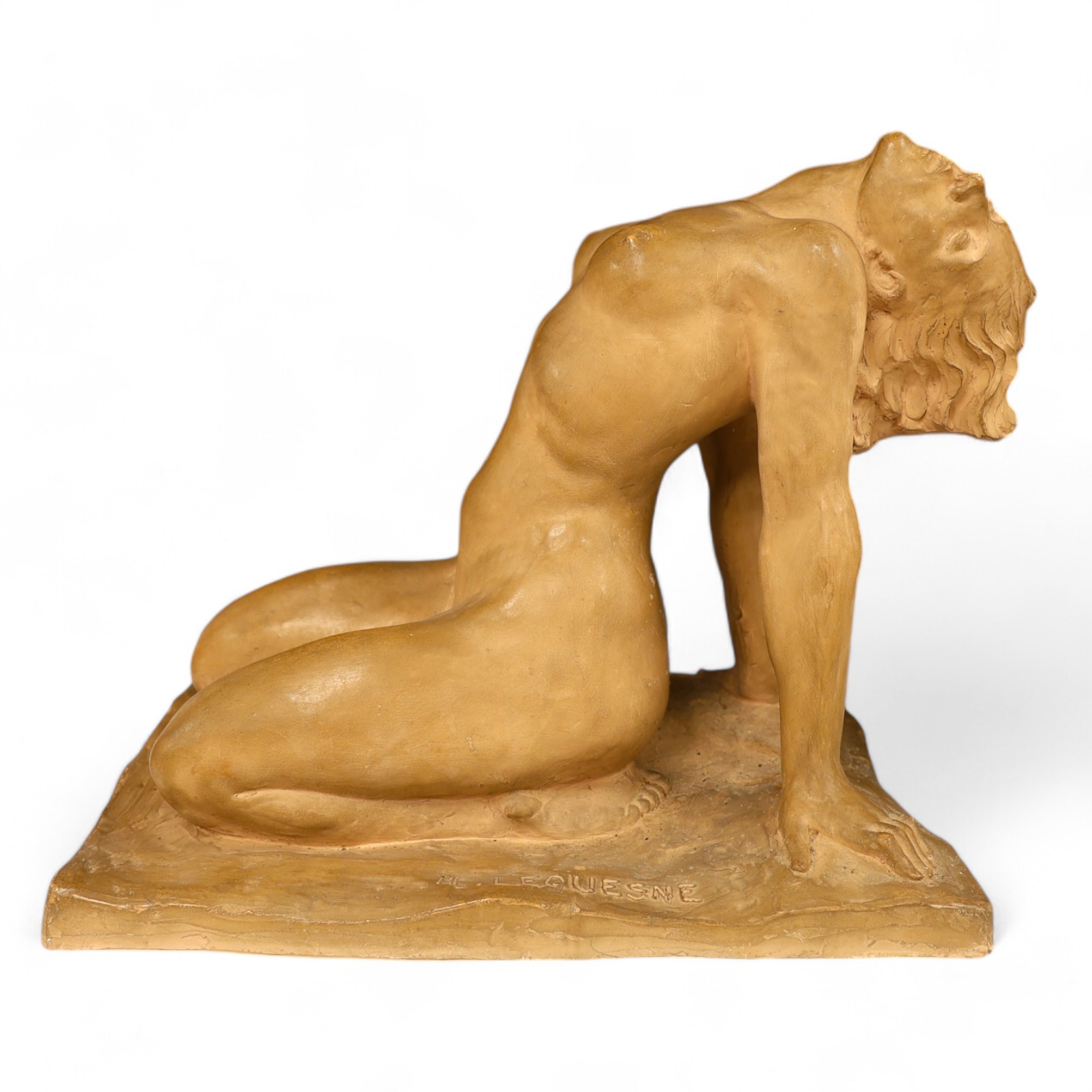 A French Art Deco terracotta semi reclining nude, stamped M. Lequesne, 36cm high. Condition - fair to good, slight scratches